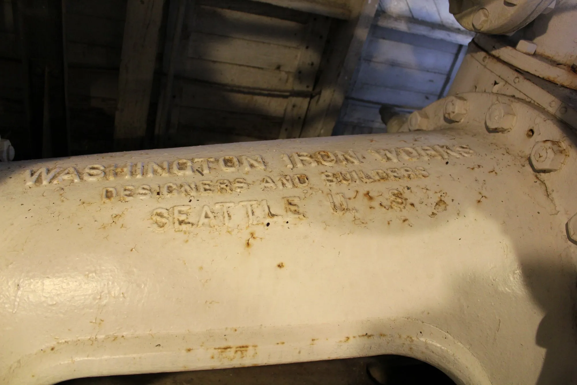 Raised lettering cast into the engine: Washington Iron Works, Designers and Builders, Seattle, U.S.A.