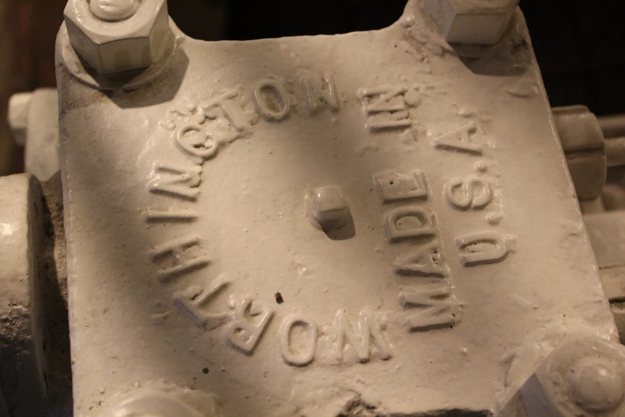 Raised lettering on a pump casting: Worthington, Made in U.S.A.