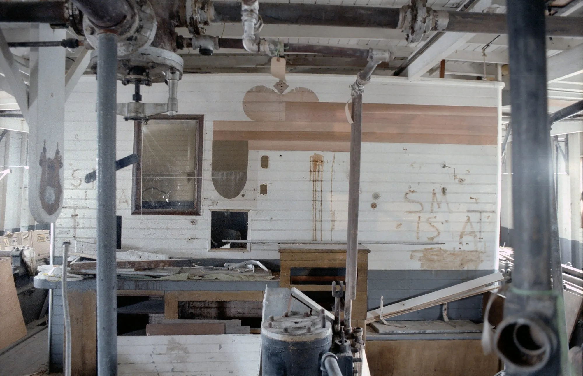 Interior bulkhead with paint and panelling removed
