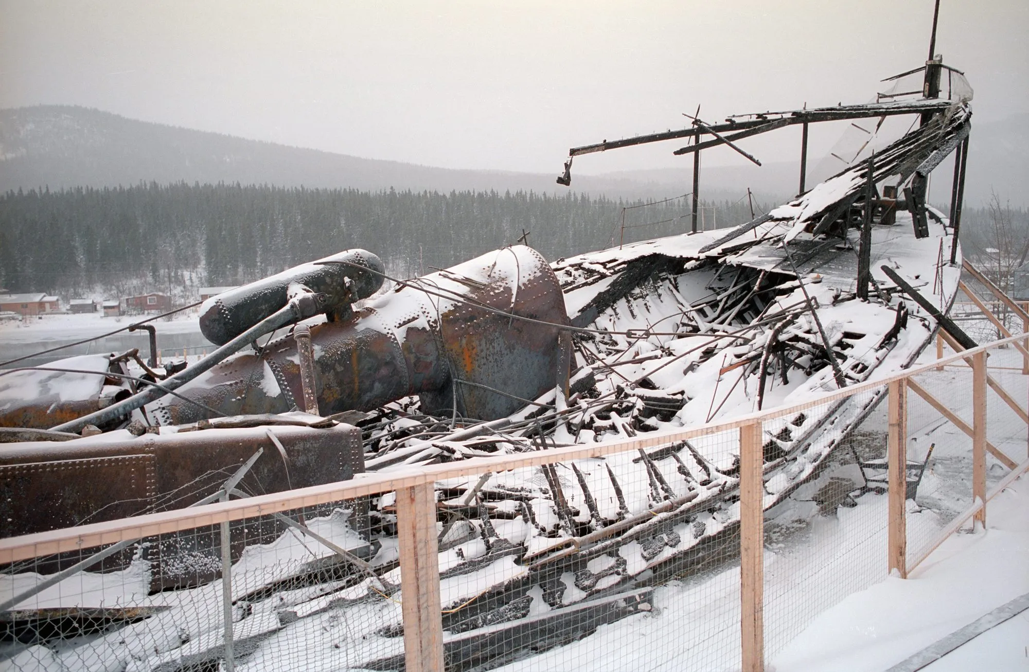 Fire-damaged remains with machinery